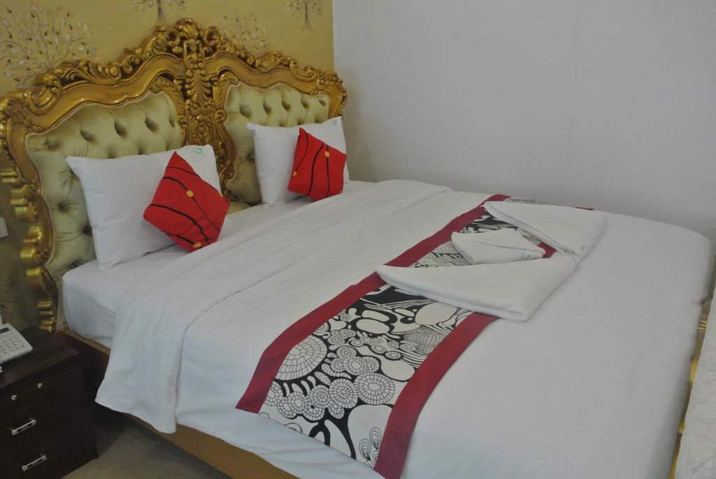 New Usouk Boutique Hotel Vientiane Chambre photo